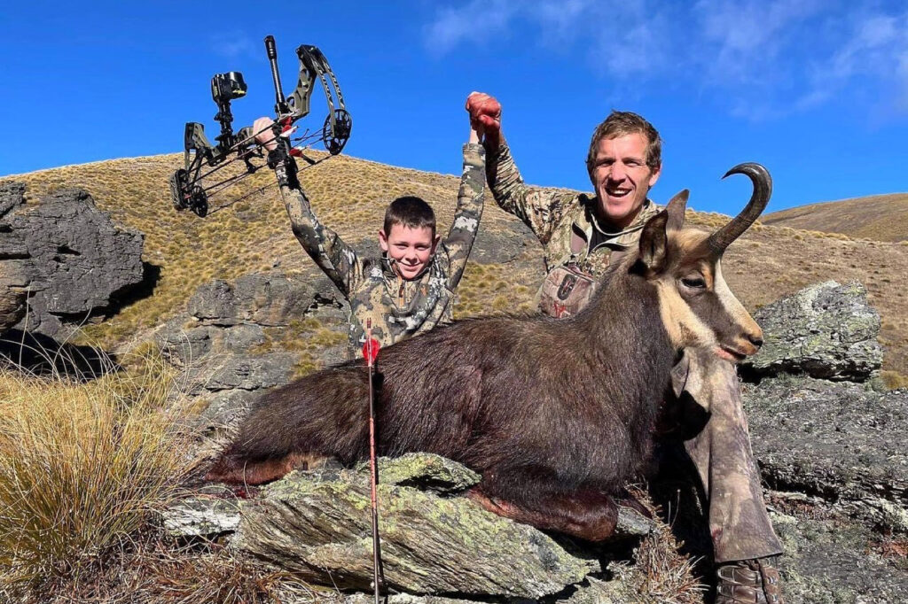 father and son bowhunting