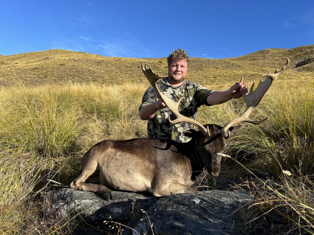 Woodsman with his hunted animal