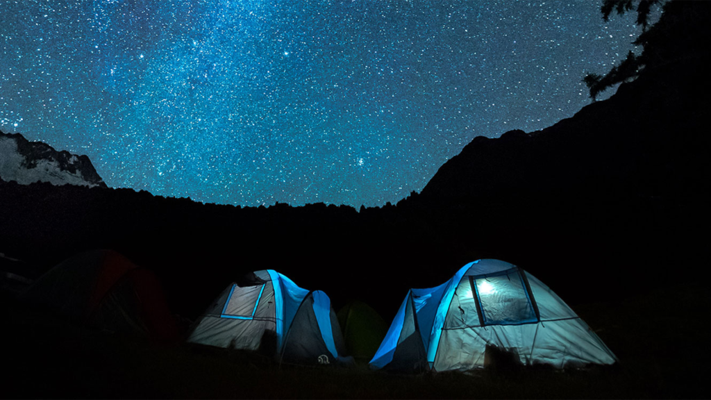 two tents at night with stars